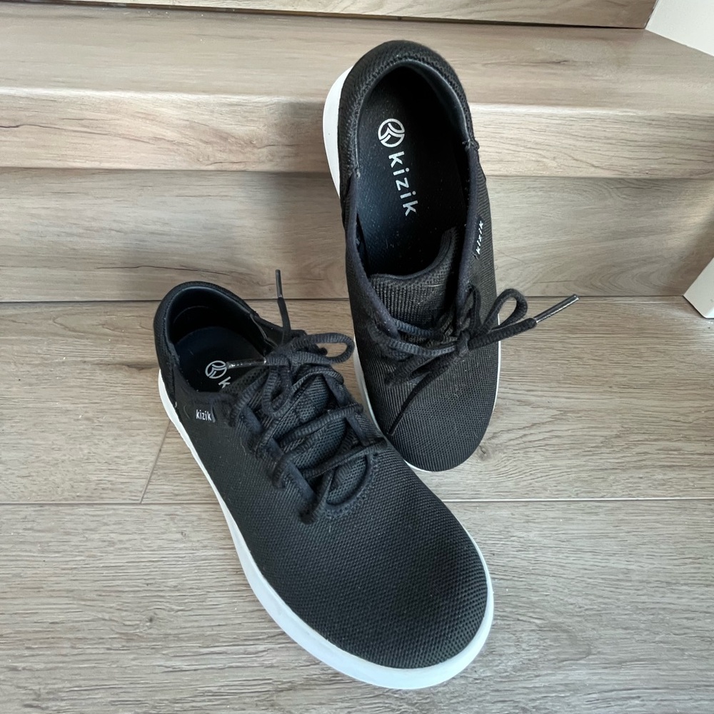 Women’s Kizik slip on athletic shoes.